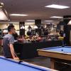 Students play pool at The Connection on campus