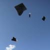 Graduation mortarboards being thrown into the air