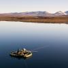 Researchers on a lake