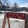 sign that reads 'essential car traffic only'