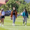 students on campus wearing masks