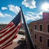 American flag flying in front of UMC