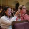 Audience members listen to a keynote speaker at the 2022 Conference on World Affairs