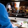 Man watching video with captions