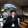 Lance Markowitz tries on virtual reality goggles at the CMCI booth at CU Boulder Next. 