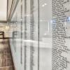 Veterans names fill the walls of the Veterans Memorial Lounge on campus