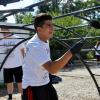 Students re-paint climbing gym at University Hill Elementary School