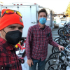 Volunteers collecting donating bikes for fire victims