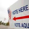 Vote here sign