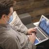 person working on laptop