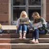 Students work on computers outside the ___
