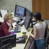 Women talking to librarian