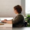 Stock image of woman using laptop