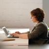 a woman using a laptop