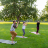 campus community members doing yoga on campus