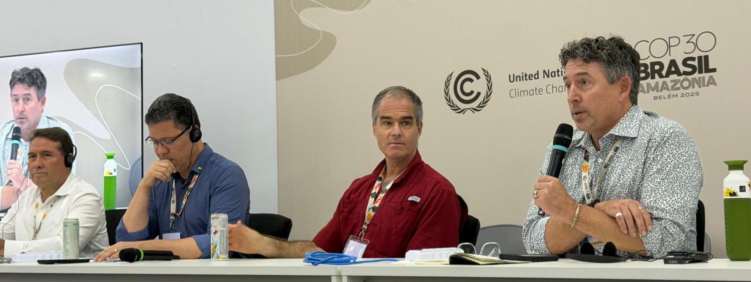 Max Boykoff speaks on a panel at COP30