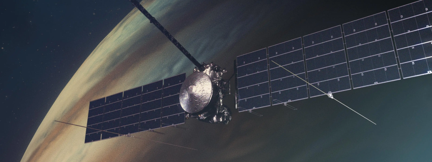 Illustration of spacecraft with solar panels deployed orbiting a planet in the background