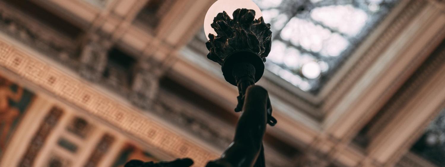 A stature in the Library of Congress building (Photo by Dineda Nyepan on Unsplash)