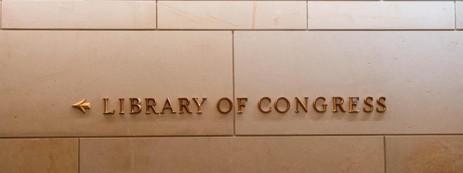 A Library of Congress sign on a stone wall (Photo by sarina gr on Unsplash)