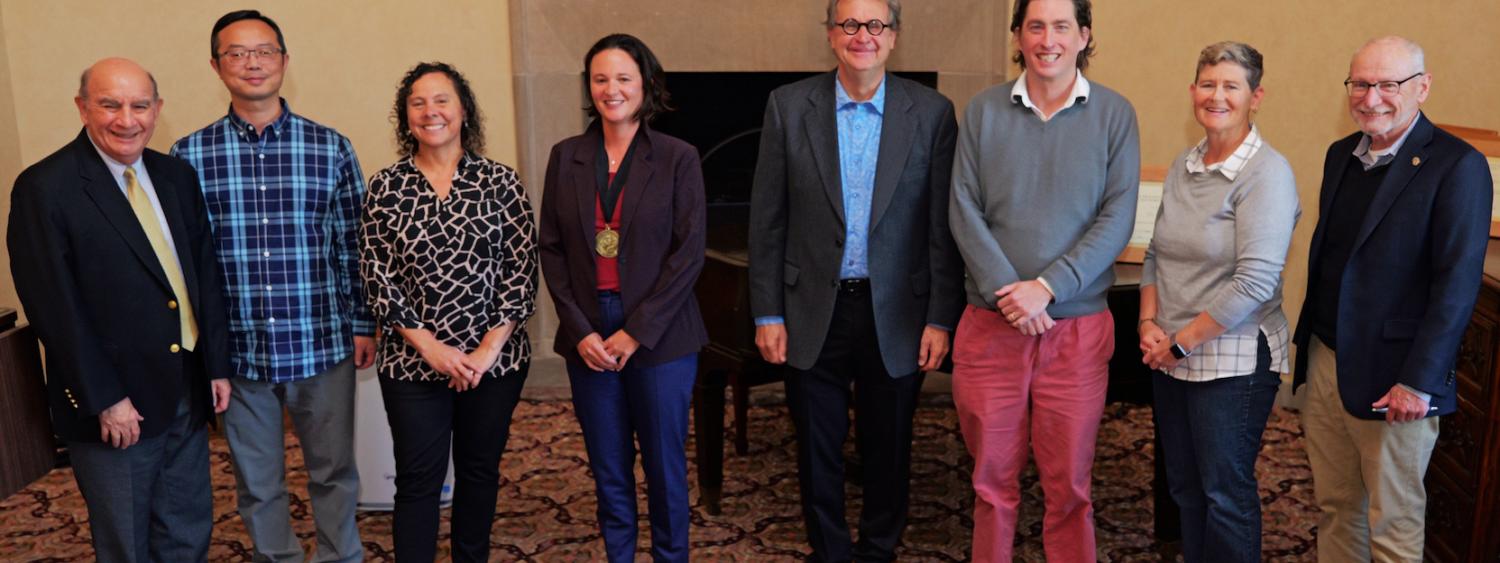 Chancellor Phil DiStefano and Provost Russ Moore pictured with faculty who have been promoted to full professor