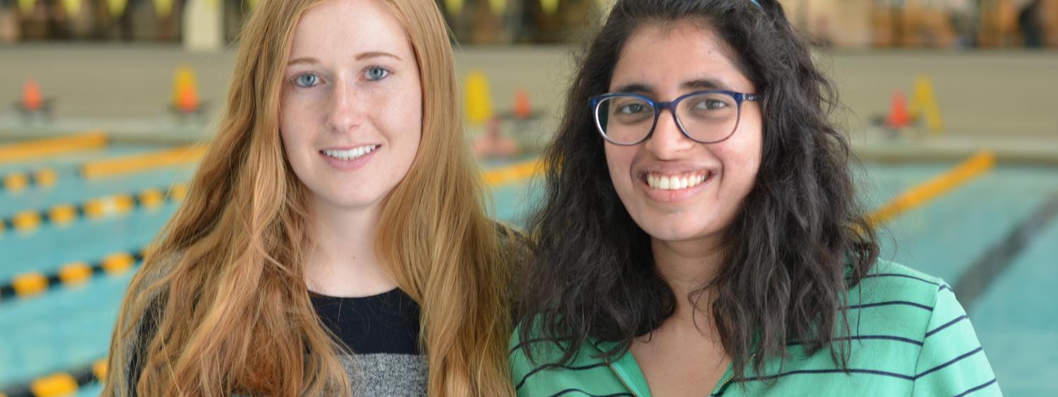 Annika Muehlbradt and Varsha Koushik with SwimSense device