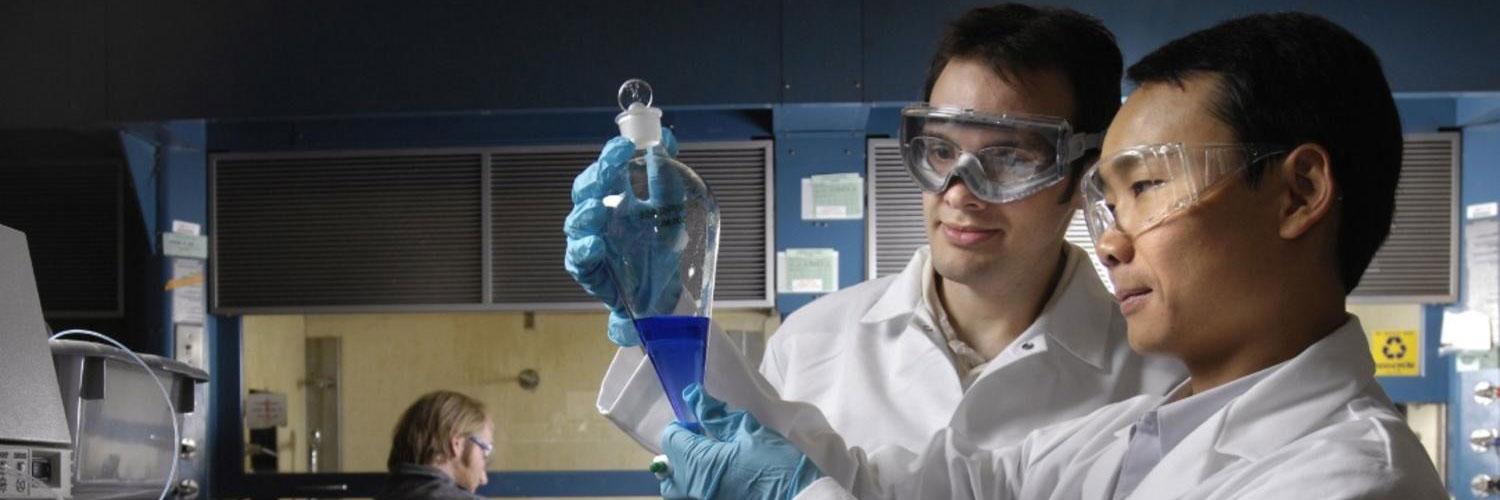 researcher and student in lab
