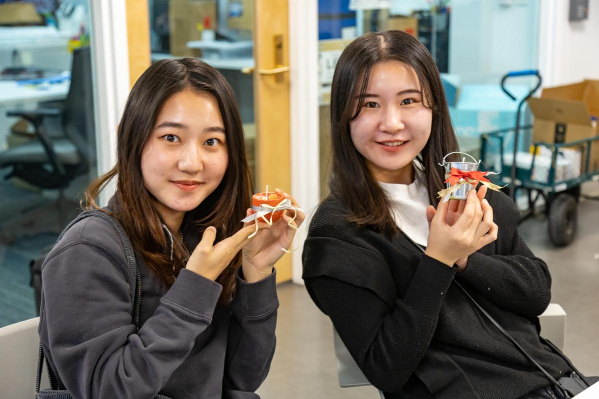 two students at a craft night