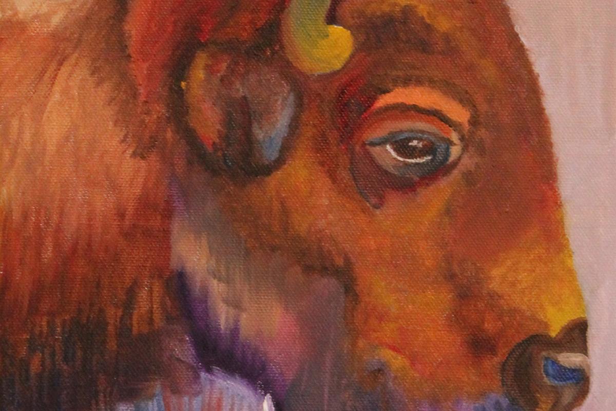 A painting of a buffalo head