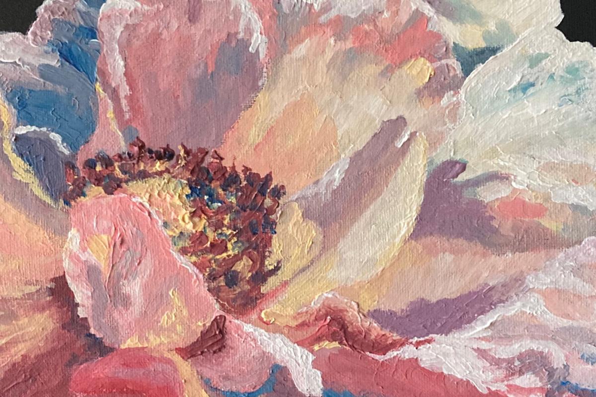 A painting of a white flower on a circular canvas