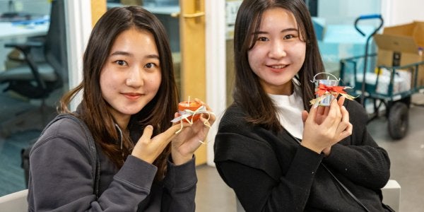 two students at a craft night