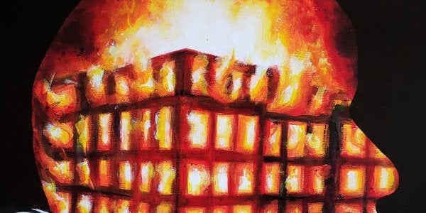 A painting of a face in profile, a burning building and a banner that reads Black Lives Matter