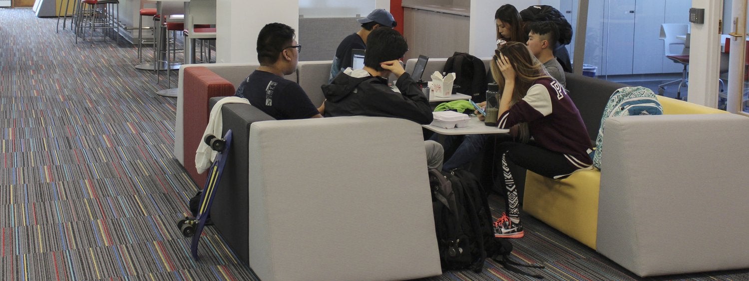 Students use the lounge in the Student Engagement & Collaboration Area