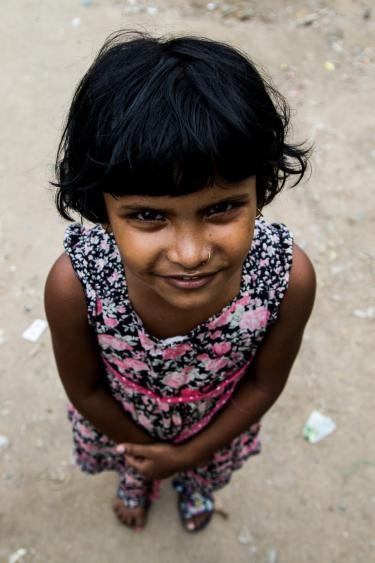 A photo of a girl in a flowered dress