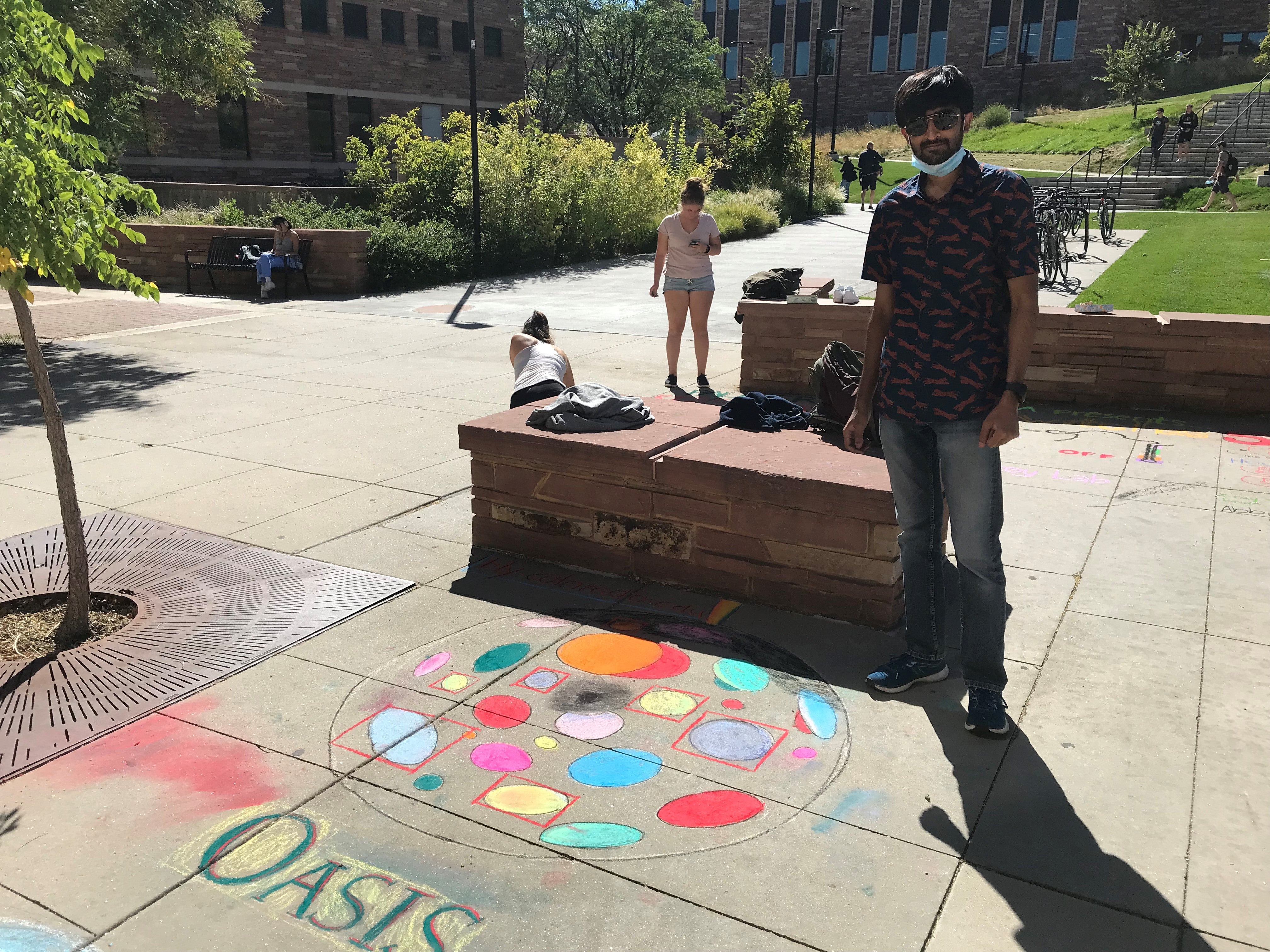 Student creating chalk art
