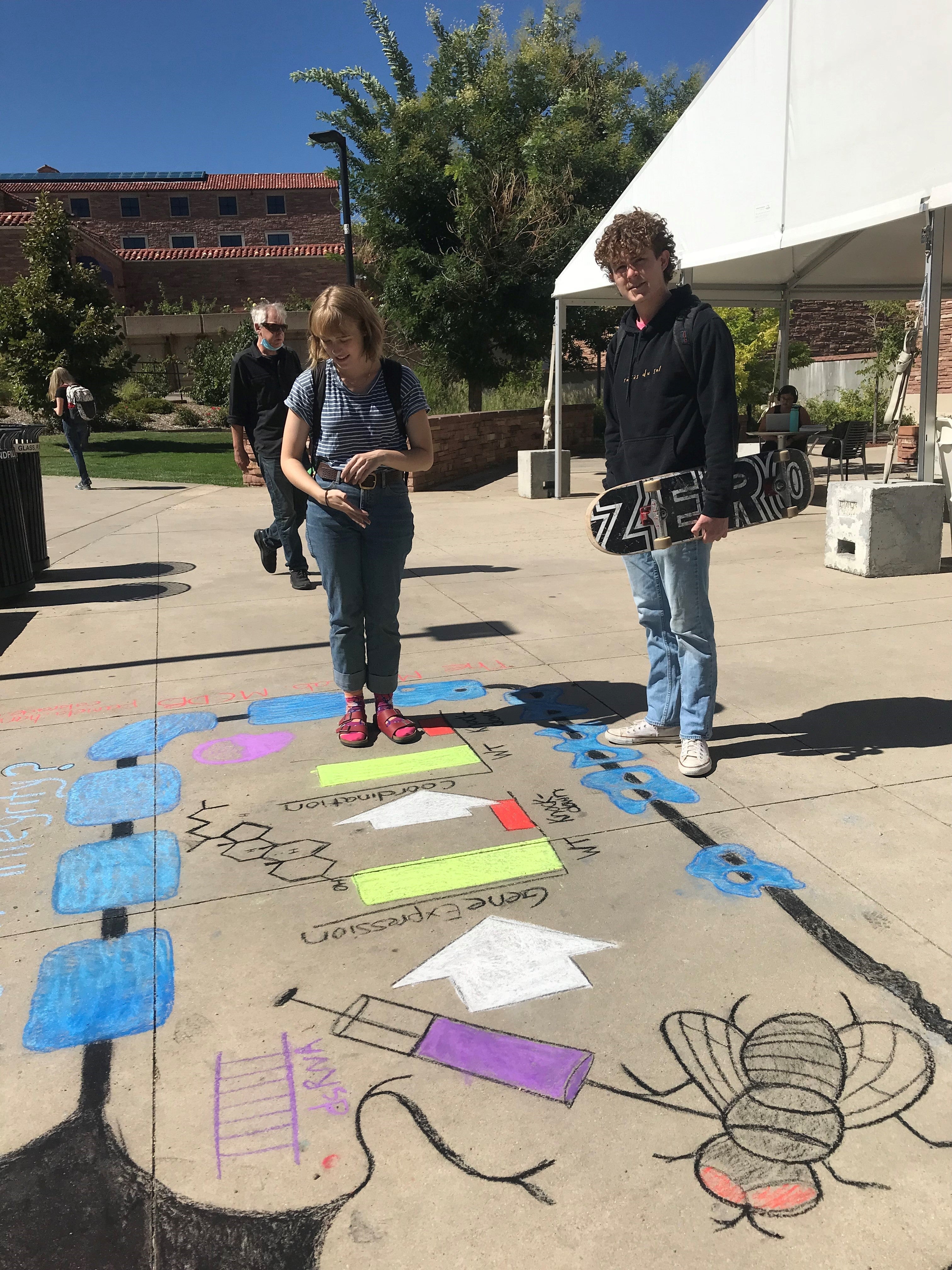 Student creating chalk art