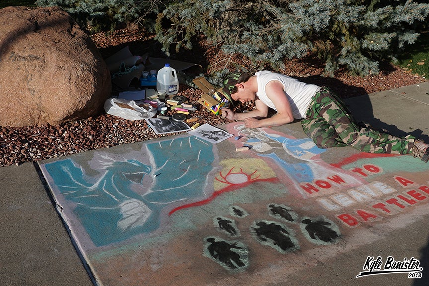 Student creating chalk art