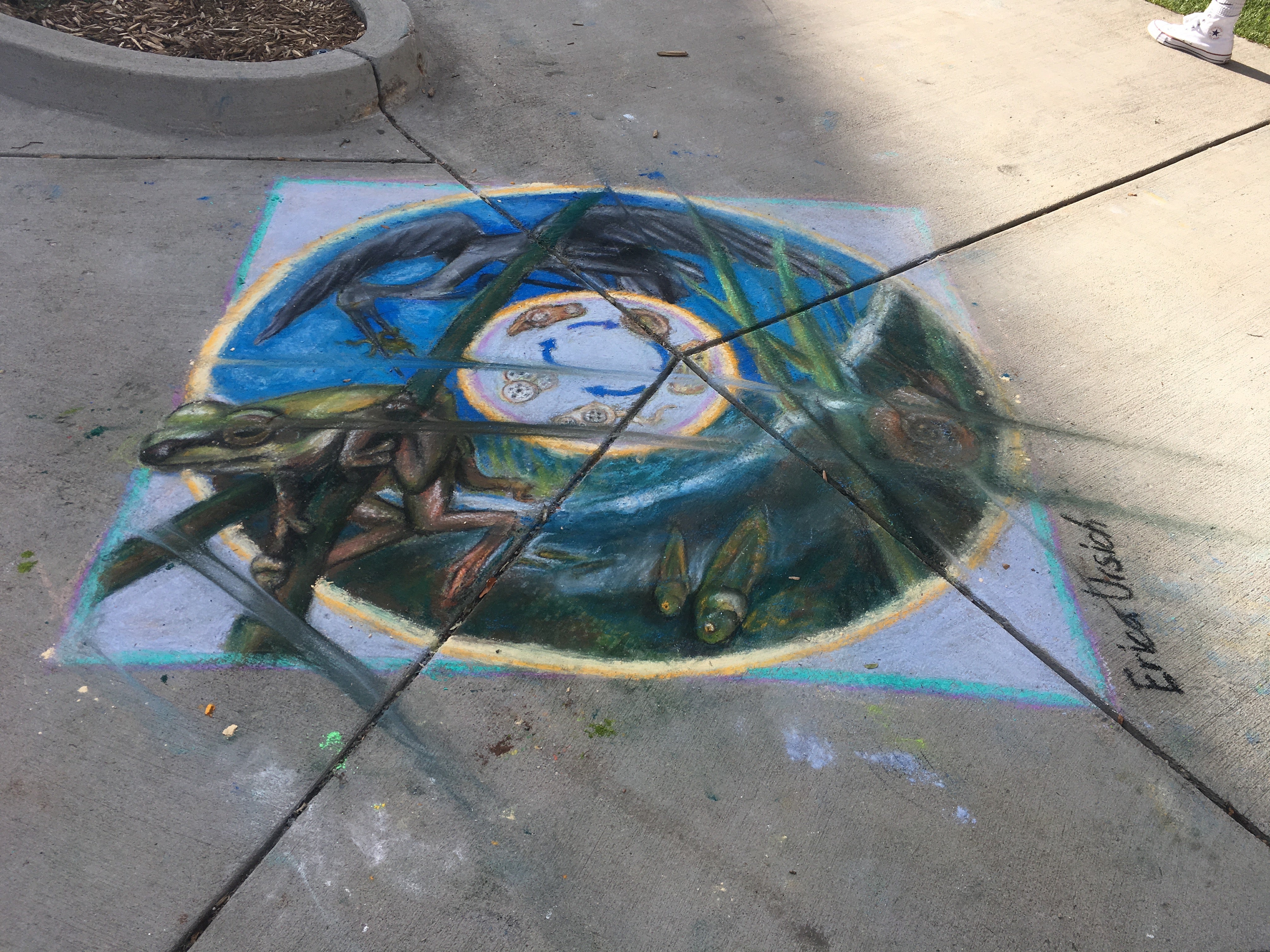 Student creating chalk art