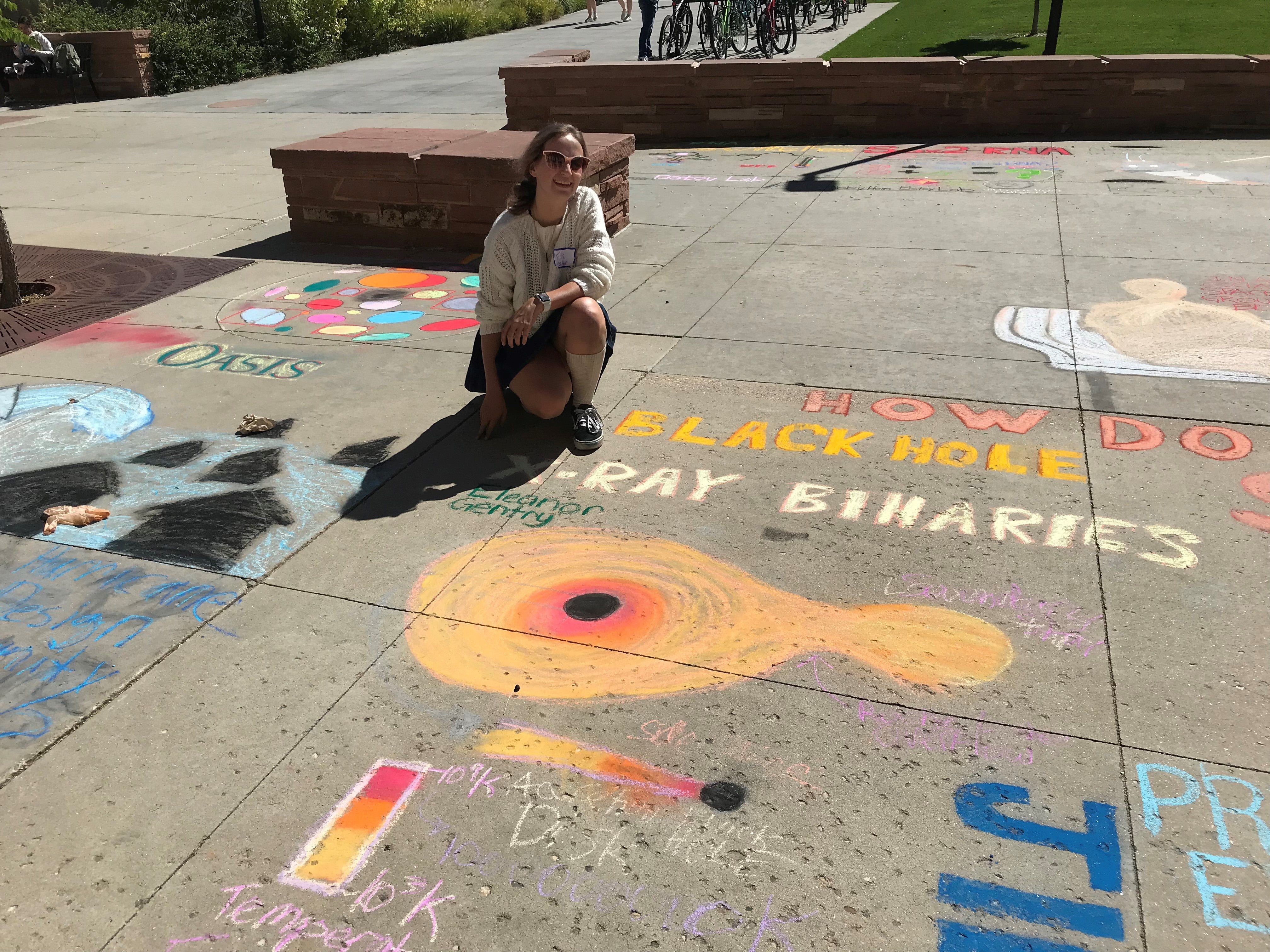 Student creating chalk art