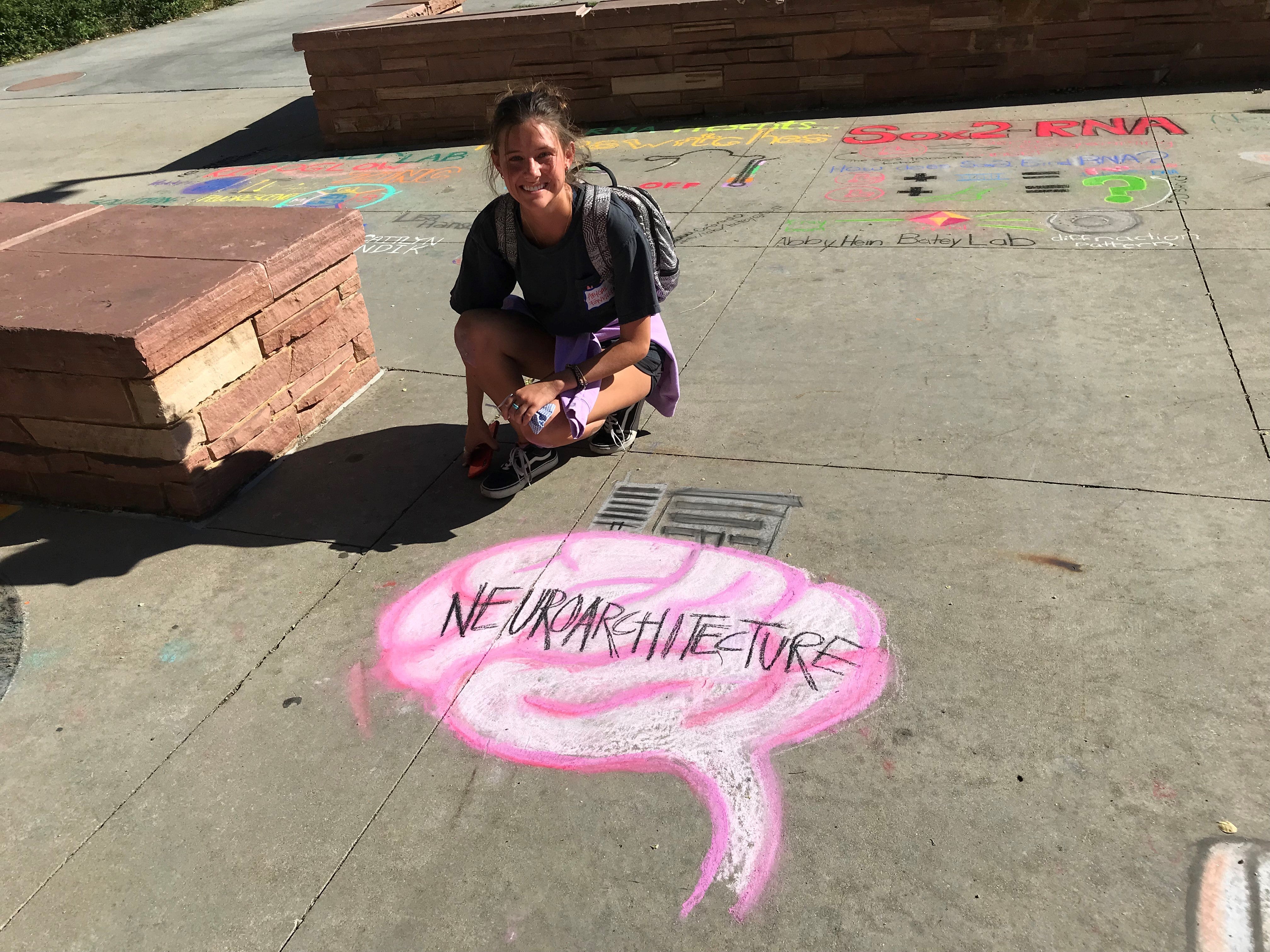 Student creating chalk art