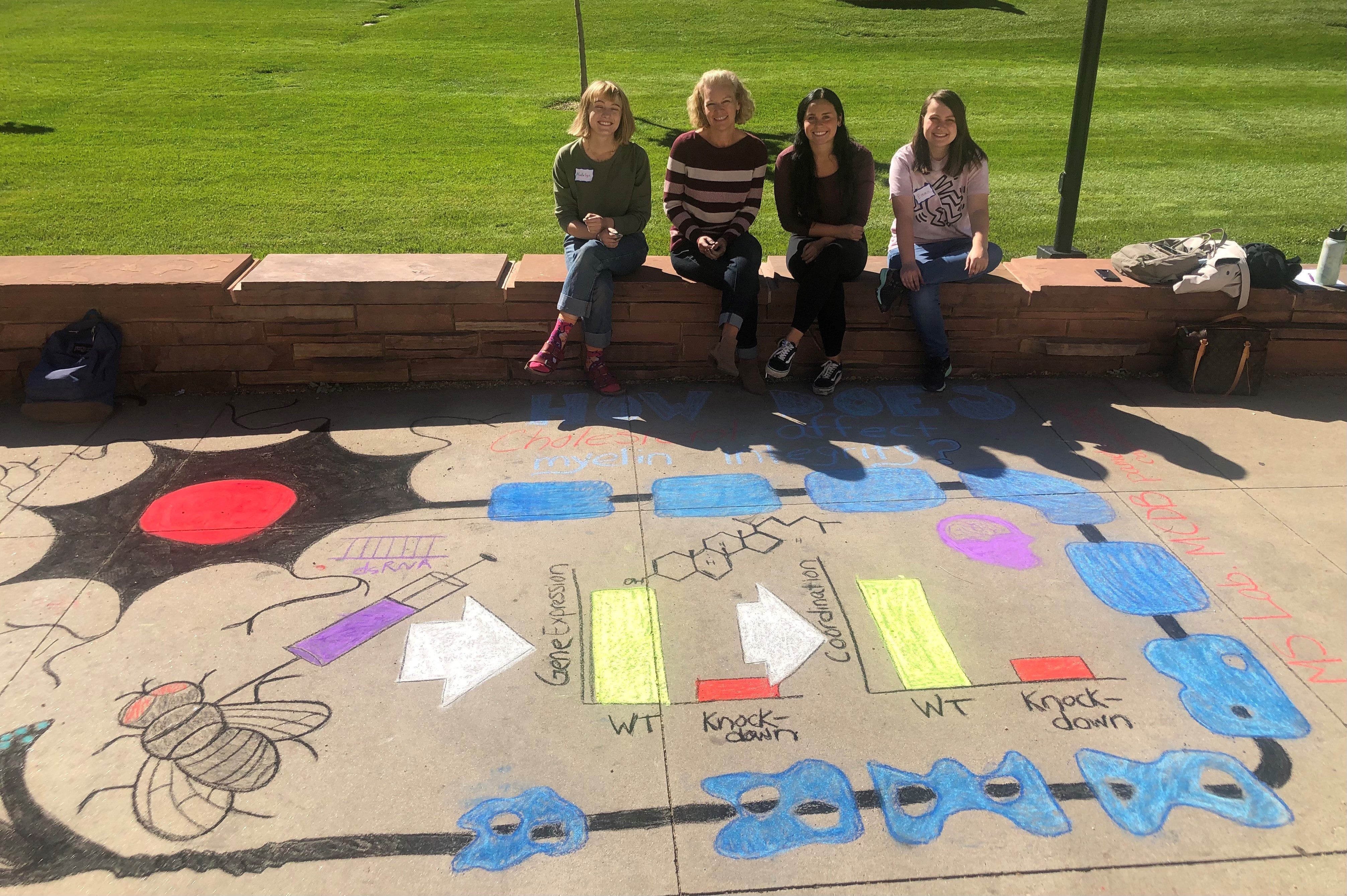 Student creating chalk art