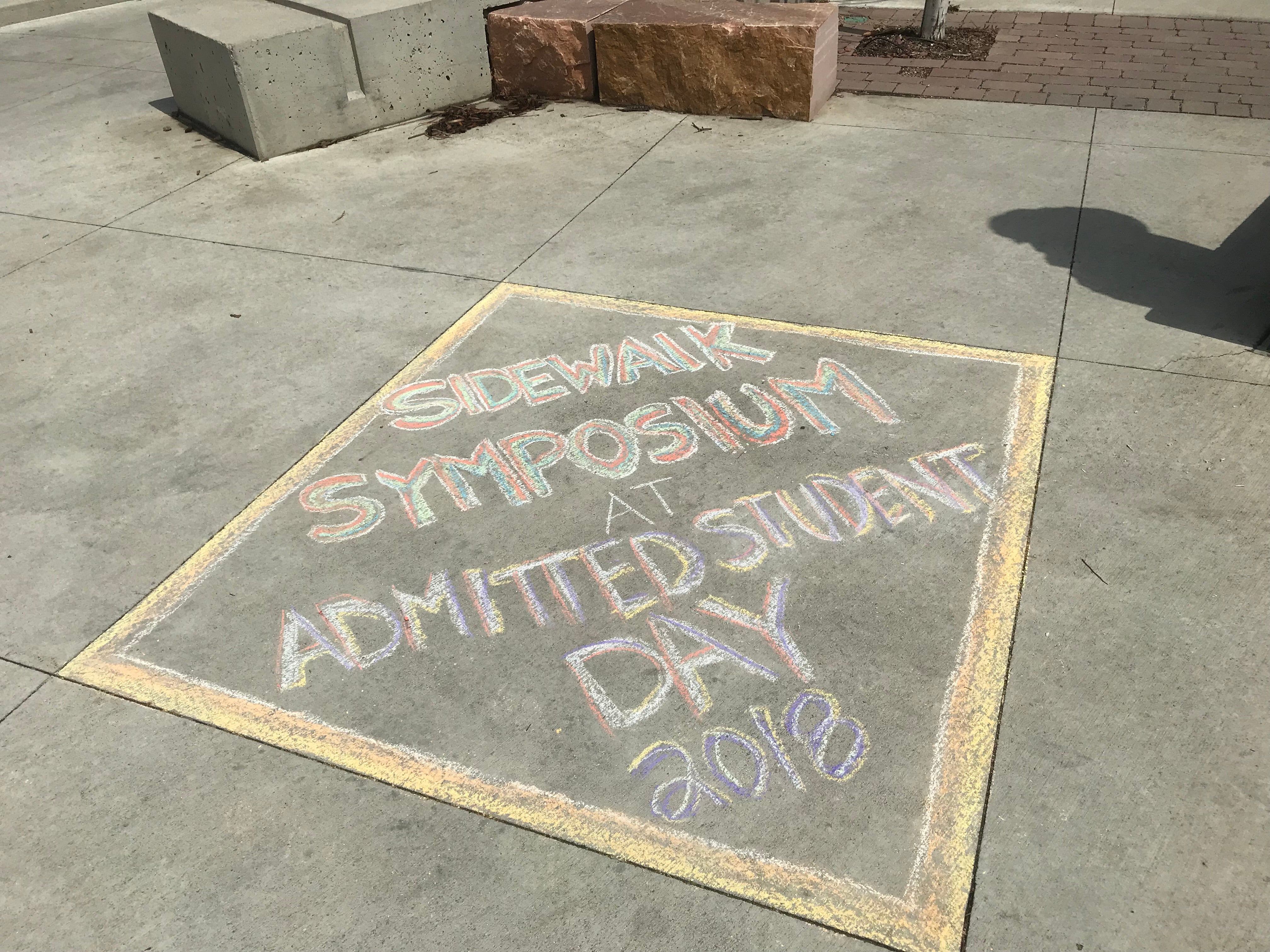 Student creating chalk art