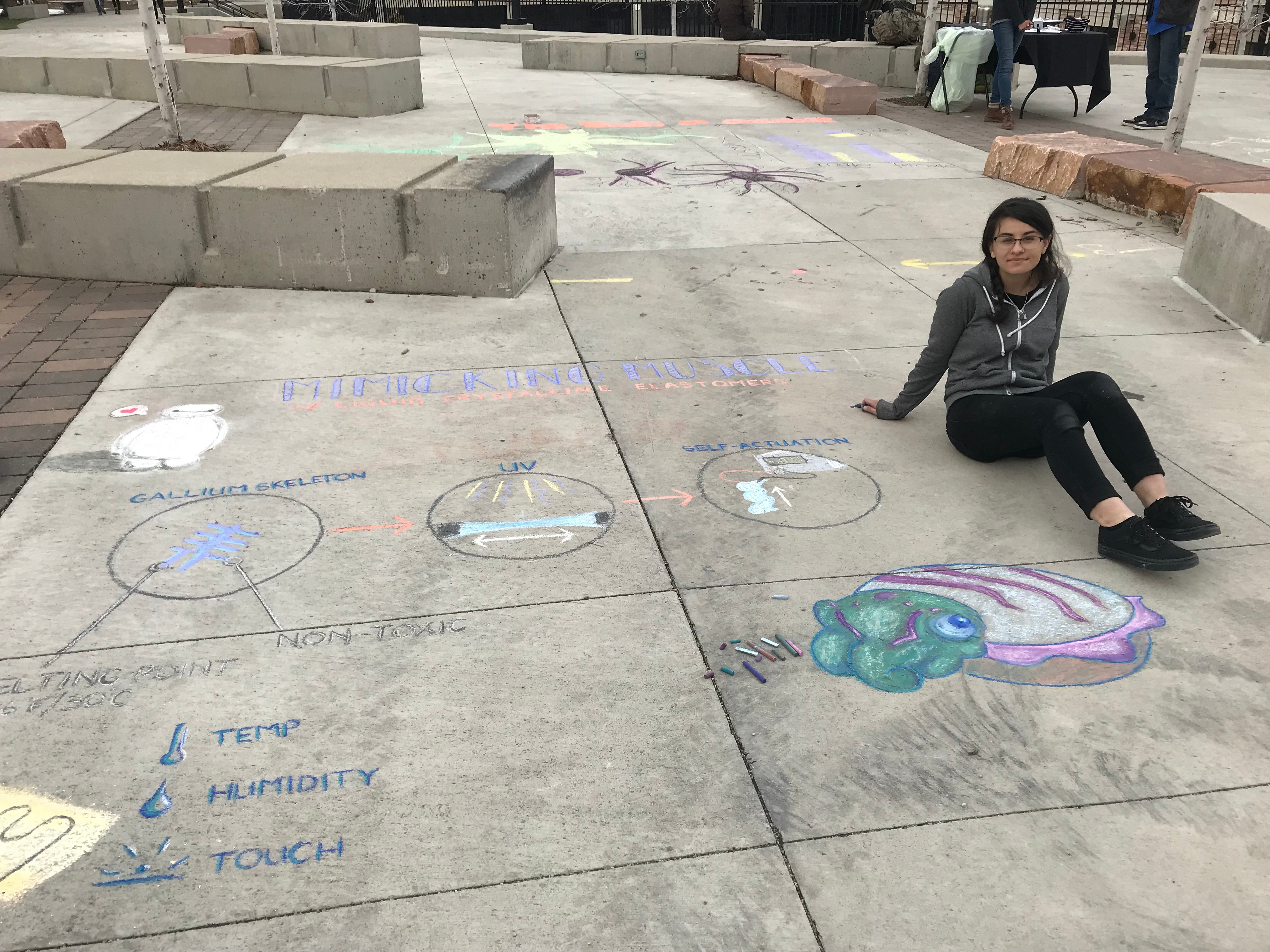 Student creating chalk art