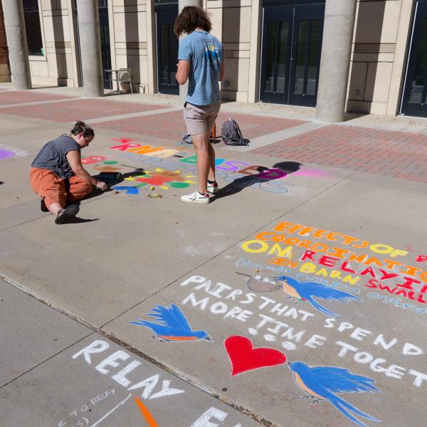 Student creating chalk art