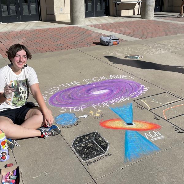 Student creating chalk art