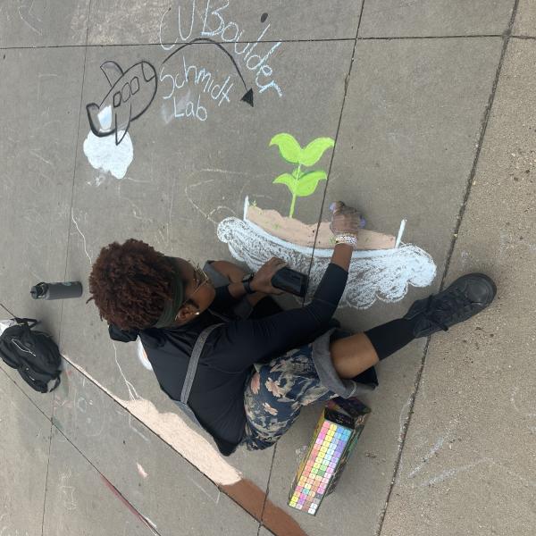 Student creating chalk art