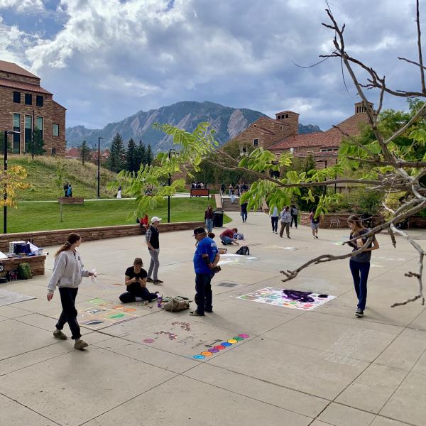 Student creating chalk art