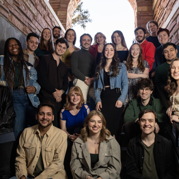 Group of students posing in a stairwell