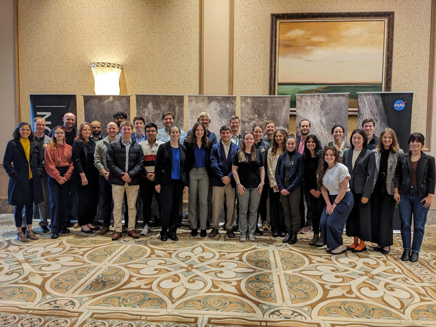 Group of students posing at a conference