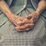 elderly lady's hands in lap
