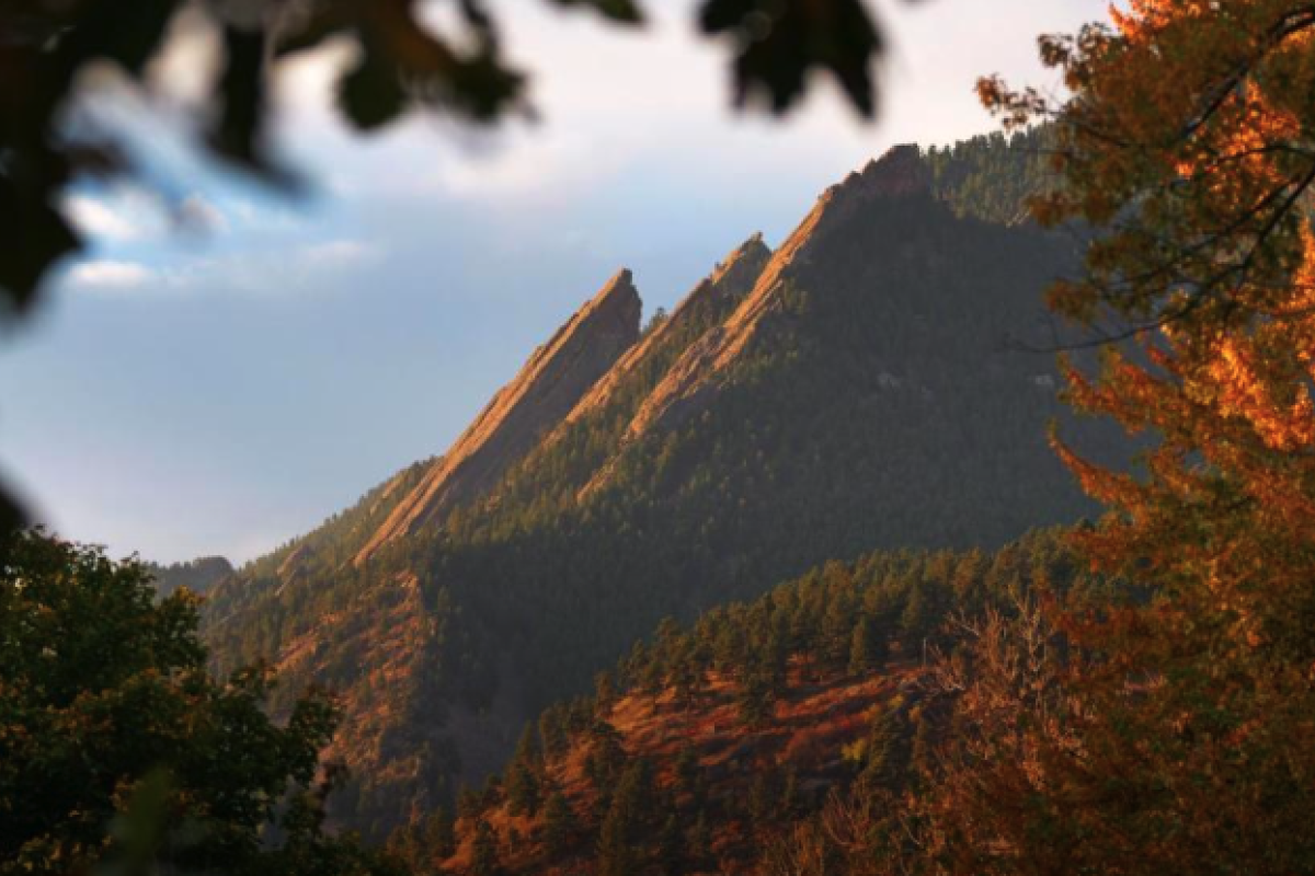 A view of the Boulder flatirons during a fall sunrise.